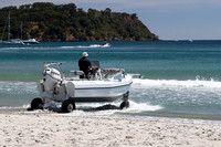 Drive boat into bay
