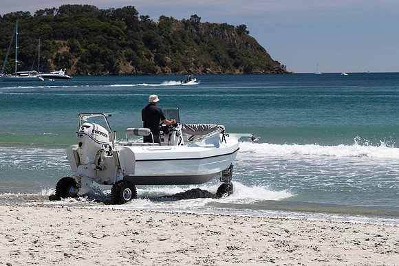 Drive boat into bay
