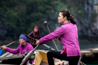 Tour boat oars-person, Vung Vieng Fishing Village, Ha Long Bay, Vietnam