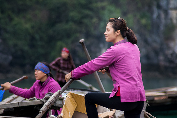 Tour boat oars-person, Vung Vieng Fishing Village, Ha Long Bay, Vietnam