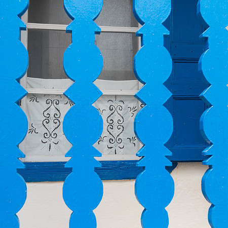 Blue balustrade & Lace curtain