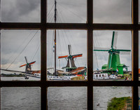 Three windmills in window
