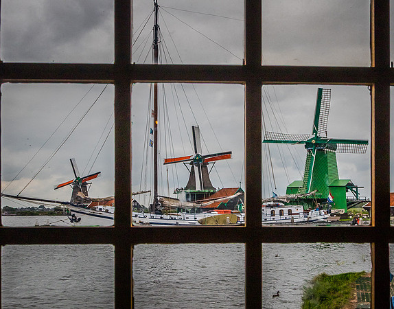 Three windmills in window