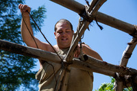 wampanoag man building a new house