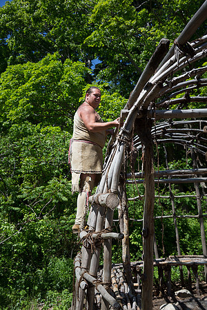 Wampanoag man building a new house 2