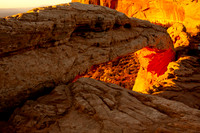 Yellow Sunrise behind Mesa Arch