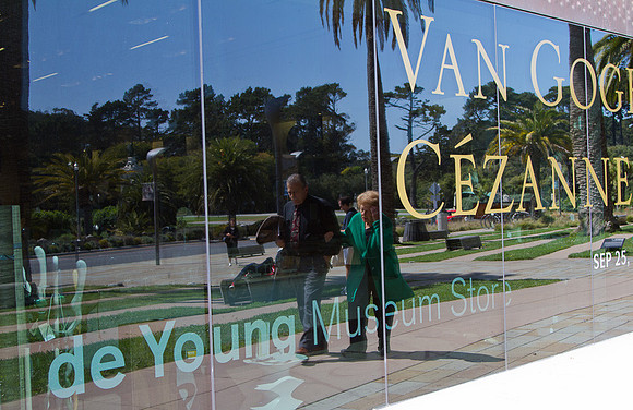 Couple reflection in museum window