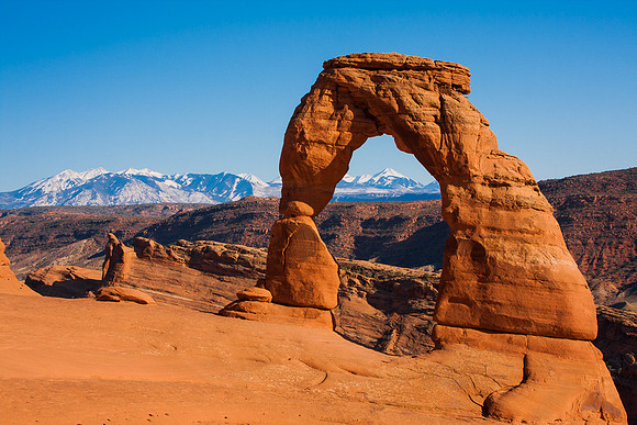 Delicate arch and La Sal Mtns.