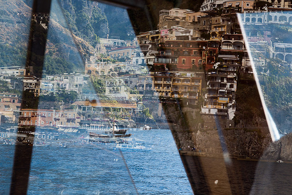 Positano reflection in boat window