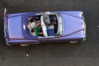 Taking a ride in a 1950's purple Chevy