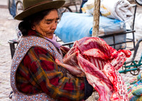 Meat Vender on Market Day, Pisac, Peru