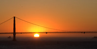 Sun under Golden Gate Bridge