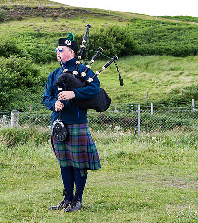 Bagpipe Player, Kilt Rock viewpoint, Staffin, Scotland