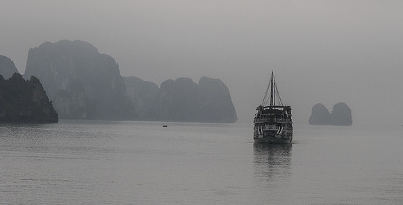 Cruise Ship on smoky Ha Long Bay