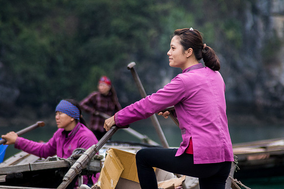 Tour boat oars-person, Vung Vieng Fishing Village, Ha Long Bay, Vietnam