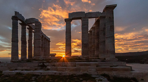 Temple of Poseidon with setting sun