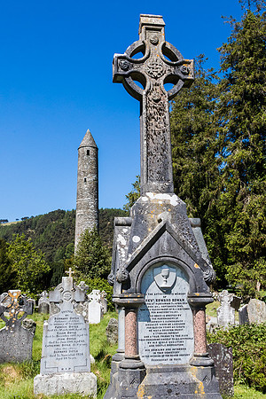 Tall celtic cross headstone at Glenadalough