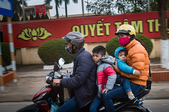 Family on Bike Phuong Tri, Viet Nam