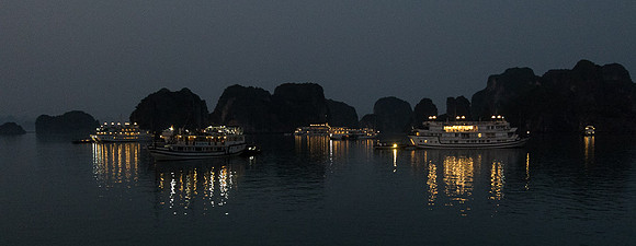 Cruise Ships anchored for the night, Ha Long Bay, Vietnam
