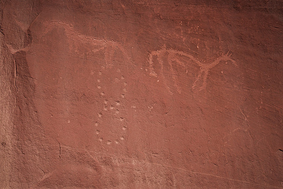 Skinny horse from Navajo
Figure 8 on end has 24 dots.  Representing the moon over the course of a year