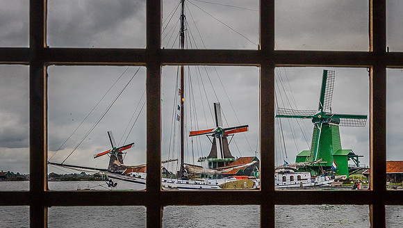 Three windmills in window