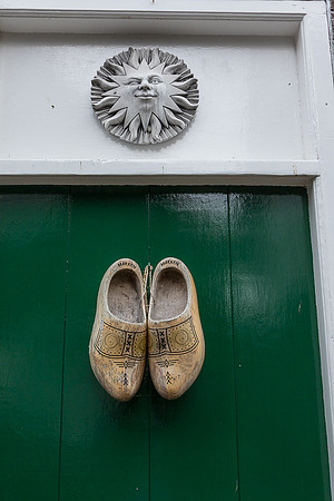 Wooden Shoes on green door