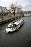 Excursion boat on the Seine by Notre Dame